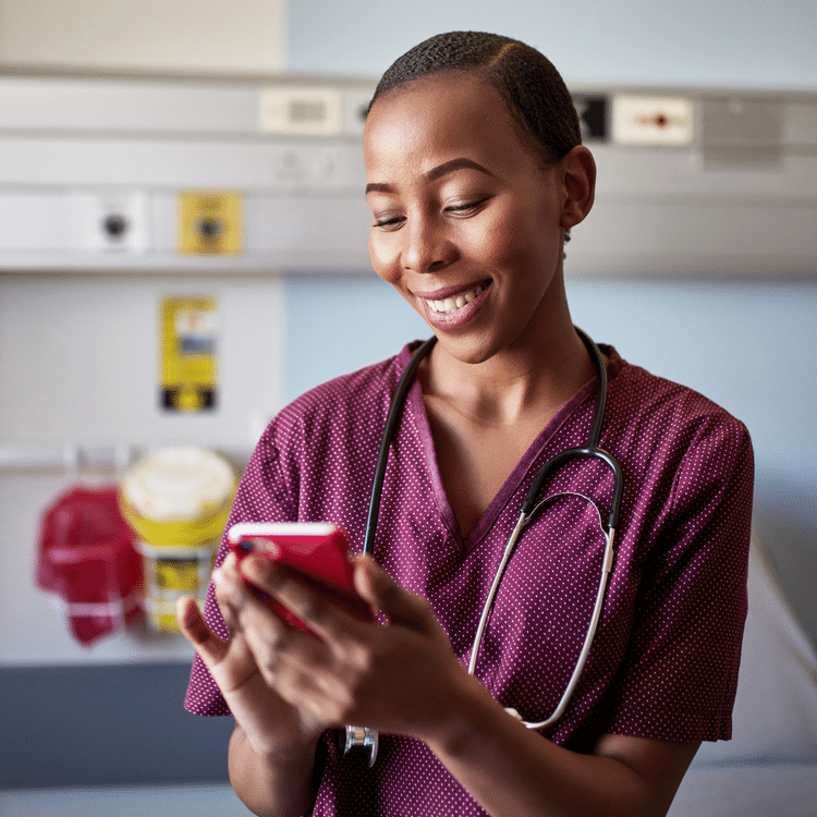 Nurse reading on her phone