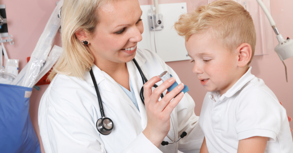 A respiratory therapist gently administers an inhaler treatment to a pediatric patient. The therapist, displaying a calm and professional demeanor, is focused on ensuring the child's comfort and effective delivery of the medication. This scene highlights the challenges faced by respiratory therapists, including providing specialized care to vulnerable populations such as children, and the need for precision and empathy in their work.